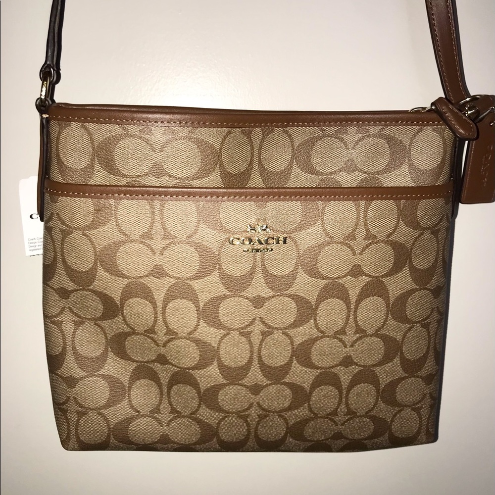 COACH FILE CROSSBODY -SIGNATURE CANVAS. BRAND NEW